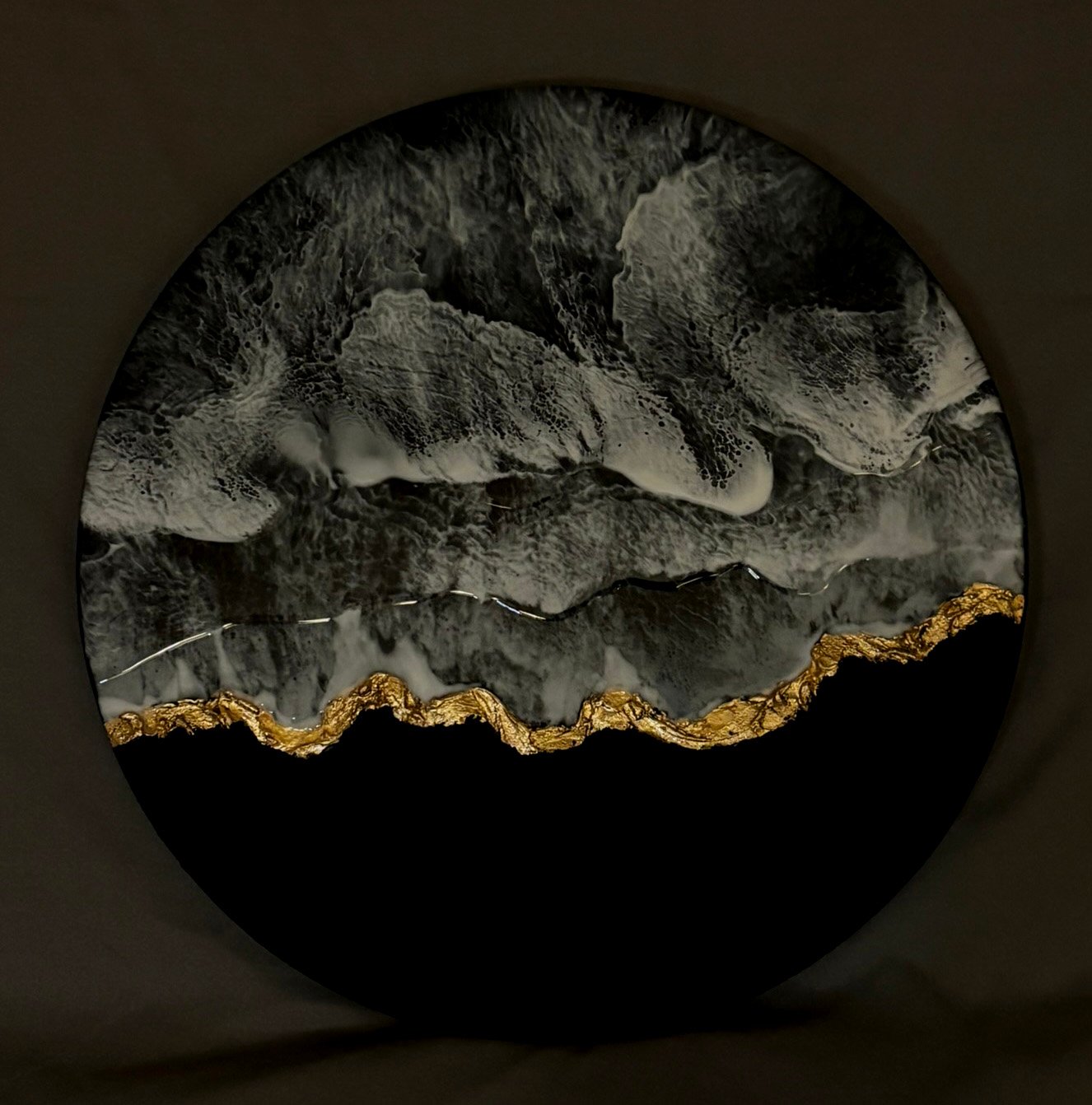 monchrome sea black gold cliffs